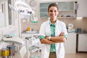 A prosthodontist in her office answers the question what is a prosthodontist