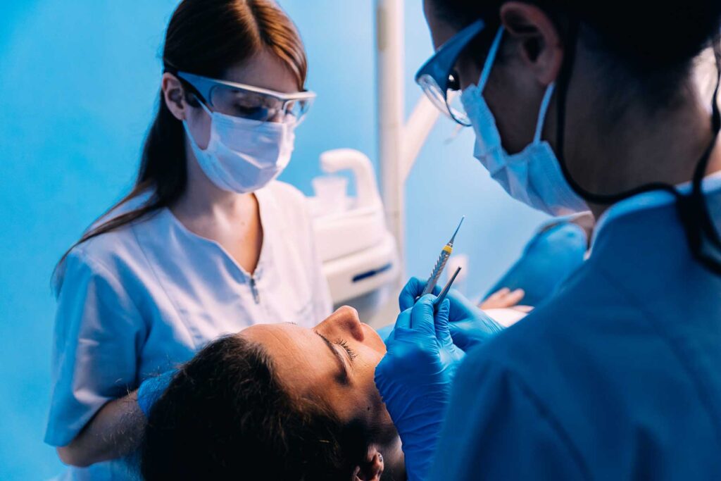 Patient undergoing implant procedure after learning how to prepare for dental implant surgery